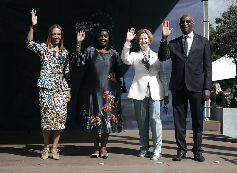 From left to right: Helen Grant (UK Prime Minister's Special Envoy for Girlsâ Education), Ambassador Raychelle Omamo (Kenyan Cabinet Secretary for Foreign Affairs), Julia Gillard (GPE Board Chair) and Minister Serigne Mbaye Thiam (GPE Vice Board Chair) raise their hands at the Global Education Summit.
