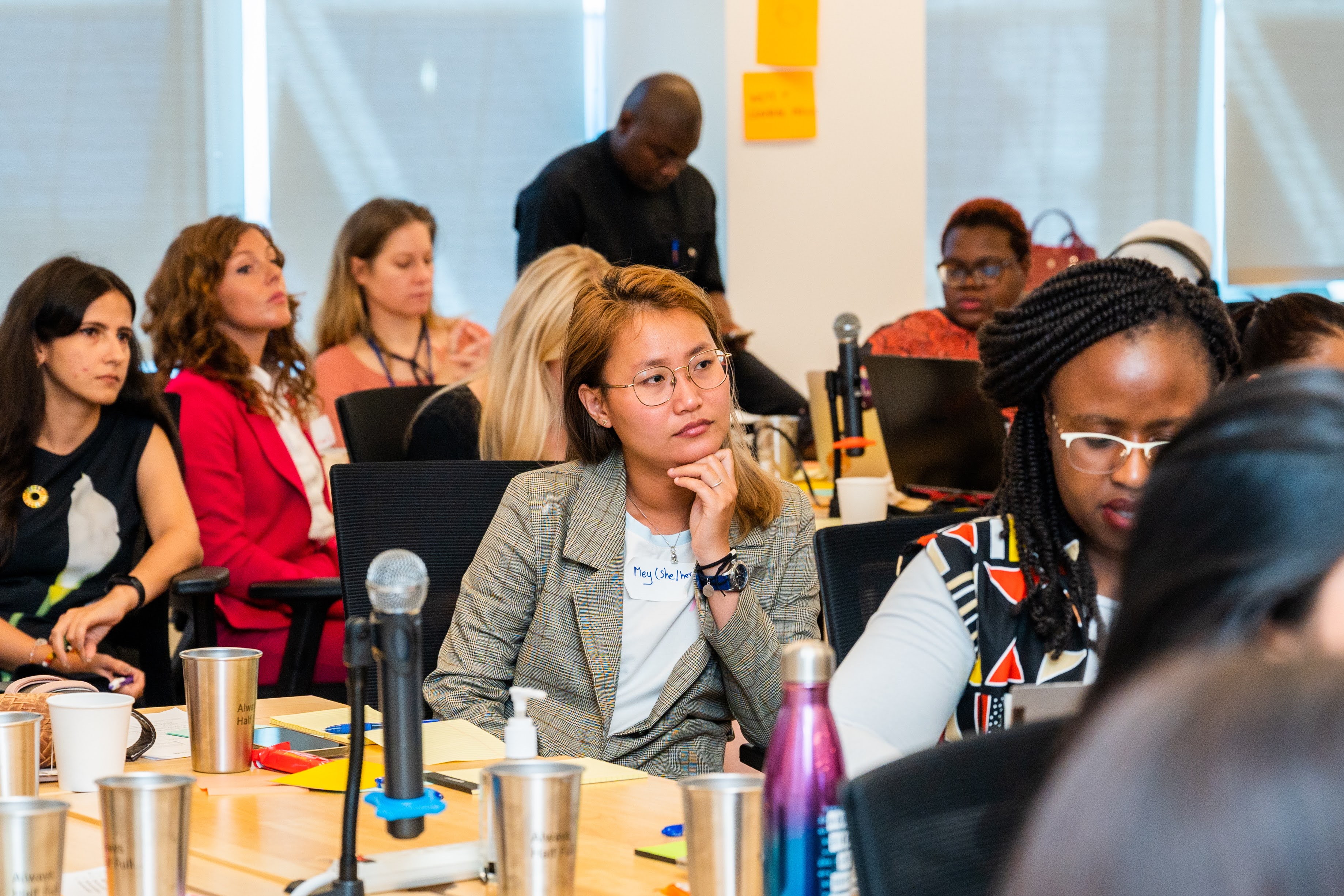 Mey listening at the feminist coalition convening in New York